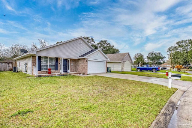 ranch-style house with concrete driveway, an attached garage, a front yard, central AC, and brick siding