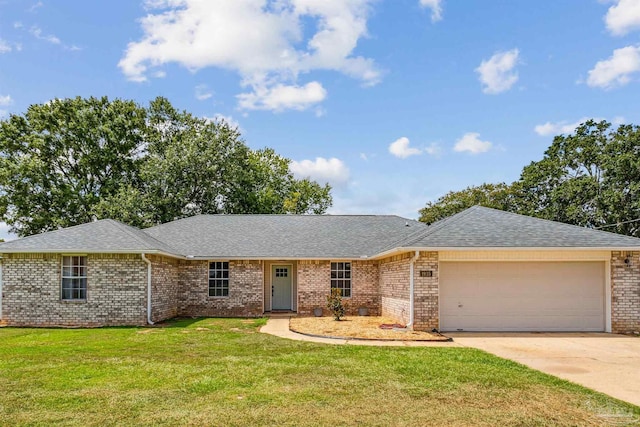 single story home with a garage, a front yard, concrete driveway, and roof with shingles