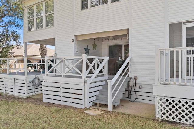 doorway to property with a wooden deck