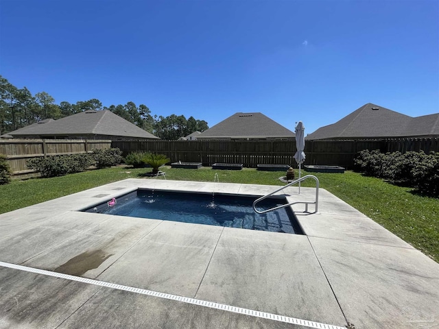 view of pool featuring a yard, a fenced backyard, and a patio area