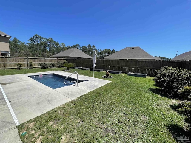 view of pool featuring a lawn, a fenced backyard, and a patio area
