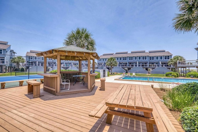 1350 Ft Pickens Rd Unit 11, Pensacola Beach, FL 32561 - wooden terrace with a gazebo and a community pool