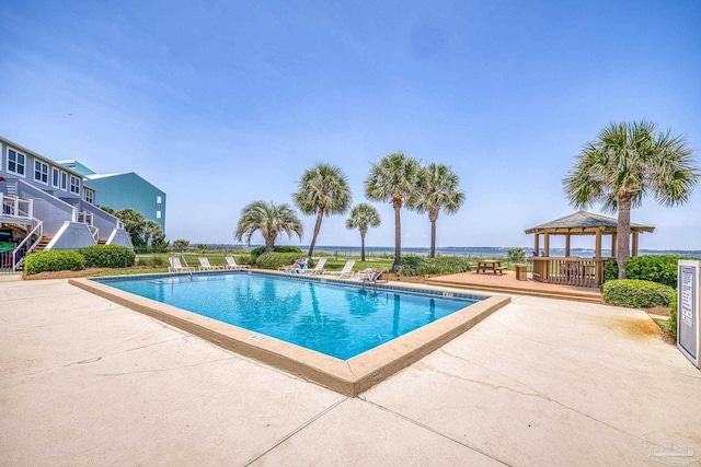 1350 Ft Pickens Rd Unit 11, Pensacola Beach, FL 32561 - community pool with a gazebo and a patio area