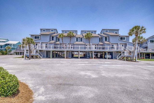 1350 Ft Pickens Rd Unit 11, Pensacola Beach, FL 32561 - view of property featuring stairs and a residential view