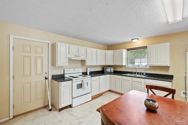 kitchen featuring electric stove, white cabinetry, and sink