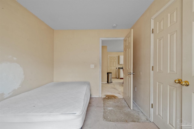 bedroom featuring a textured ceiling