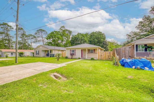 ranch-style home with a front lawn