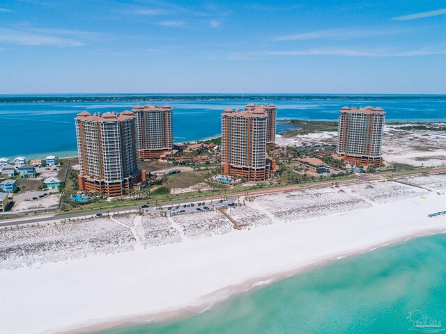 aerial view with a view of the beach and a water view