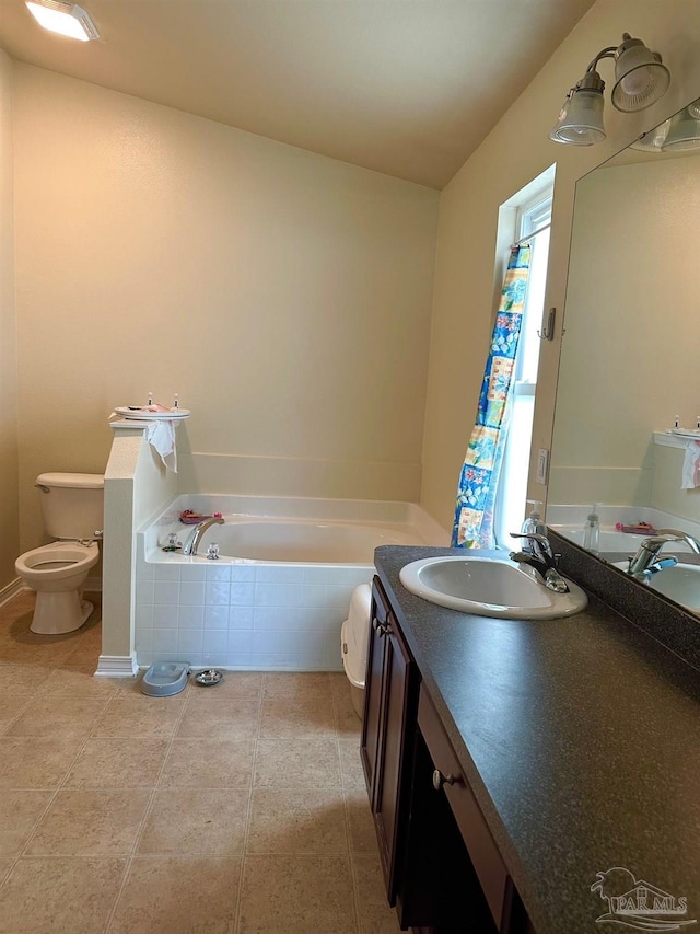 4955 Makenna Cir, Pace, FL 32571 - bathroom with vanity, toilet, a bath, and tile patterned flooring
