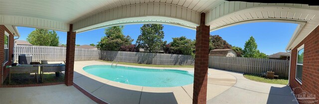 4955 Makenna Cir, Pace, FL 32571 - view of swimming pool featuring a patio and a fenced backyard