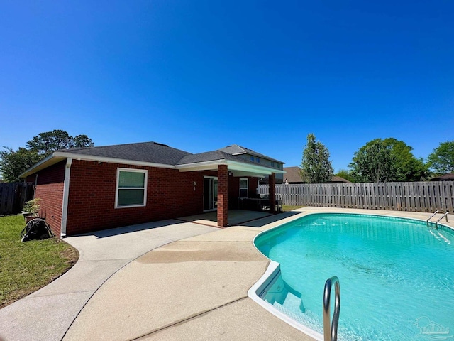 4955 Makenna Cir, Pace, FL 32571 - view of swimming pool featuring a patio and a fenced backyard