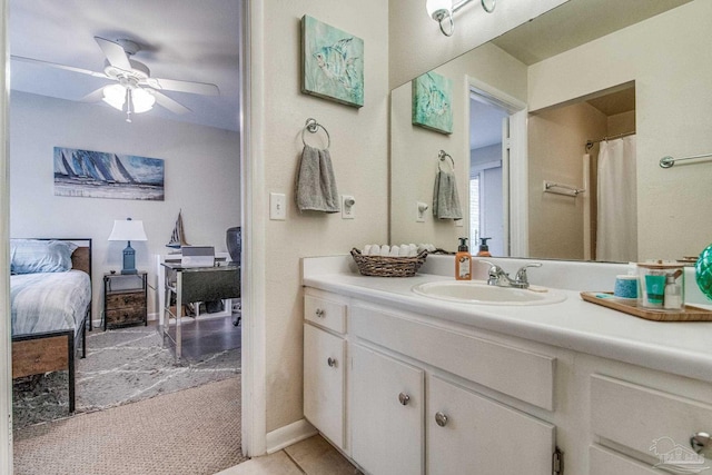 bathroom featuring vanity and ceiling fan