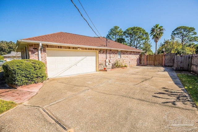 view of side of property featuring a garage