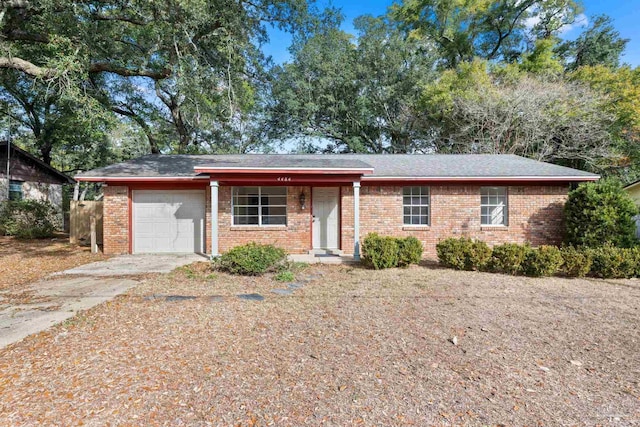 single story home with a garage