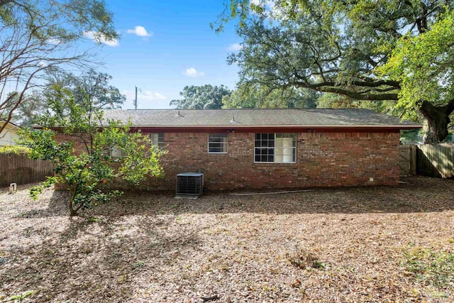 back of property with central AC unit