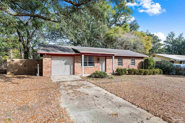 ranch-style house featuring a garage