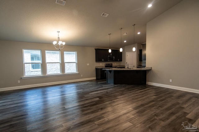 4483 Watkins St, Pace, FL 32571 - kitchen featuring stainless steel appliances, lofted ceiling, open floor plan, a chandelier, and a peninsula