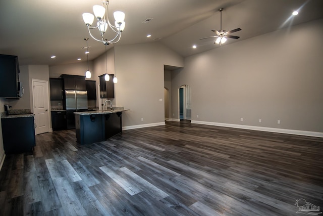 4483 Watkins St, Pace, FL 32571 - kitchen with open floor plan, a ceiling fan, a sink, a peninsula, and high vaulted ceiling
