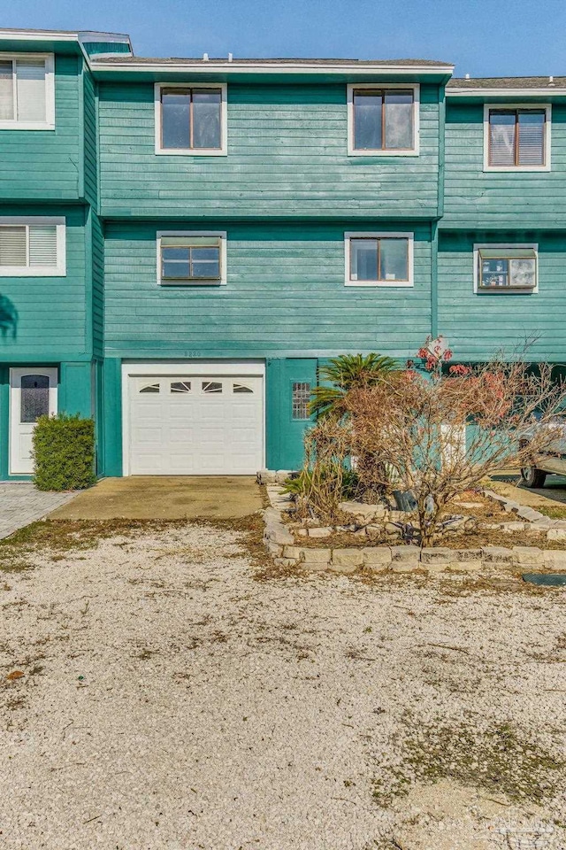 exterior space with a garage