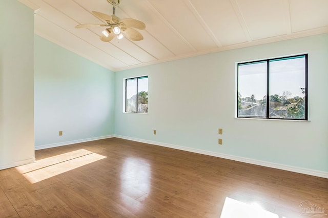 spare room featuring ceiling fan and wood-type flooring