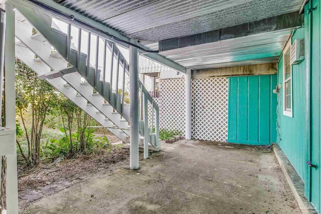 view of patio / terrace with a wall mounted air conditioner