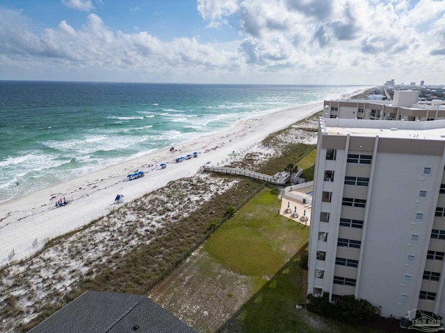 birds eye view of property featuring a water view and a view of the beach
