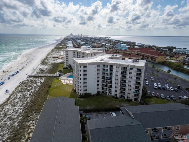 aerial view featuring a water view and a view of the beach