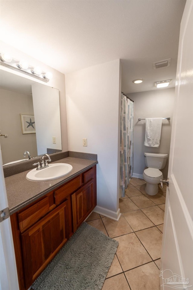 full bathroom featuring toilet, curtained shower, visible vents, tile patterned flooring, and vanity