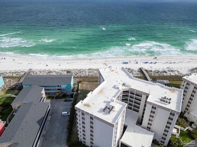 bird's eye view featuring a water view and a view of the beach