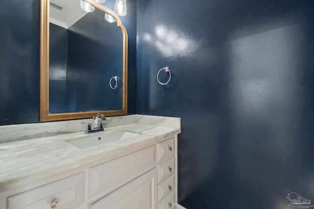 bathroom featuring visible vents and vanity
