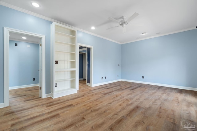 unfurnished bedroom featuring ornamental molding, recessed lighting, wood finished floors, and baseboards