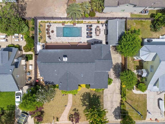 birds eye view of property with a residential view