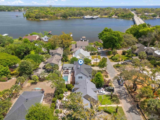 bird's eye view with a water view and a residential view