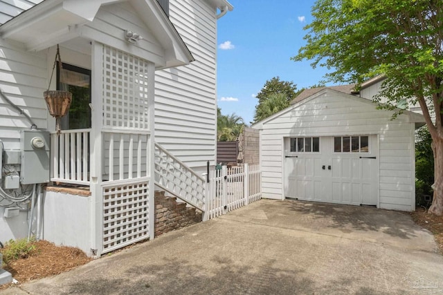 garage featuring driveway