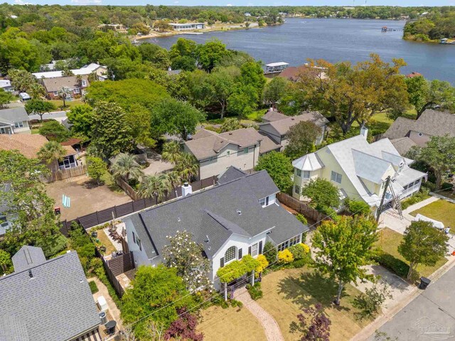 birds eye view of property featuring a water view and a residential view