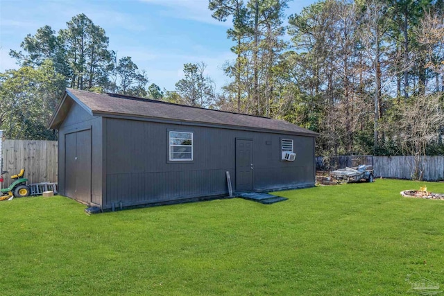 view of outdoor structure featuring a yard