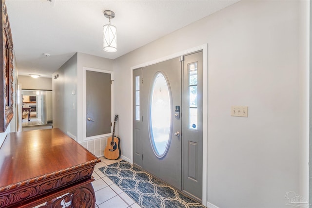 entrance foyer with light tile patterned flooring