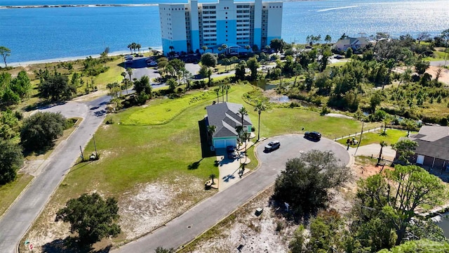 drone / aerial view with a water view