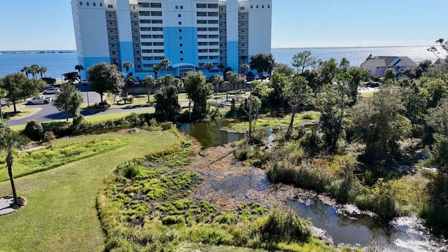 birds eye view of property featuring a water view