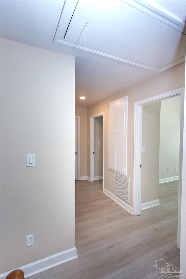 hall featuring light hardwood / wood-style floors