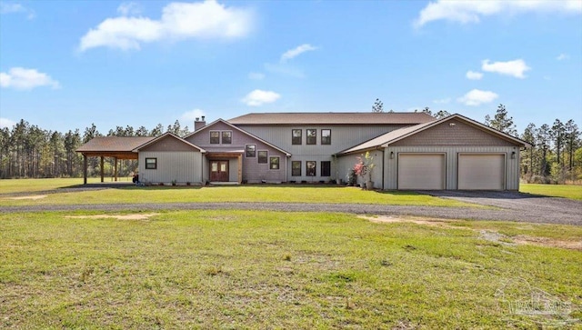 3351 Velor Rd, Mcdavid, FL 32568 - view of front of house with driveway, a front yard, and a garage