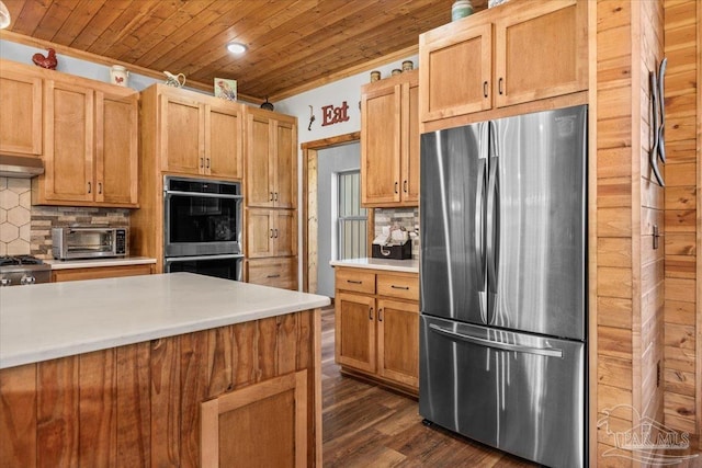 3351 Velor Rd, Mcdavid, FL 32568 - kitchen with a toaster, backsplash, wooden ceiling, and appliances with stainless steel finishes