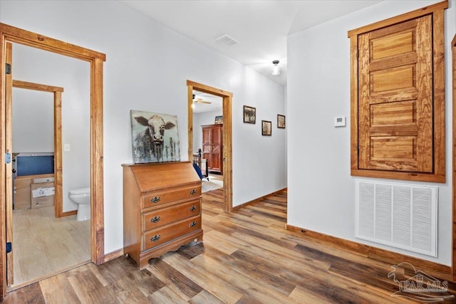 3351 Velor Rd, Mcdavid, FL 32568 - corridor with wood finished floors, baseboards, and visible vents