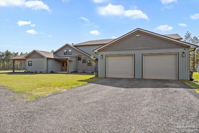 3351 Velor Rd, Mcdavid, FL 32568 - view of front of property with driveway, a garage, and a front lawn