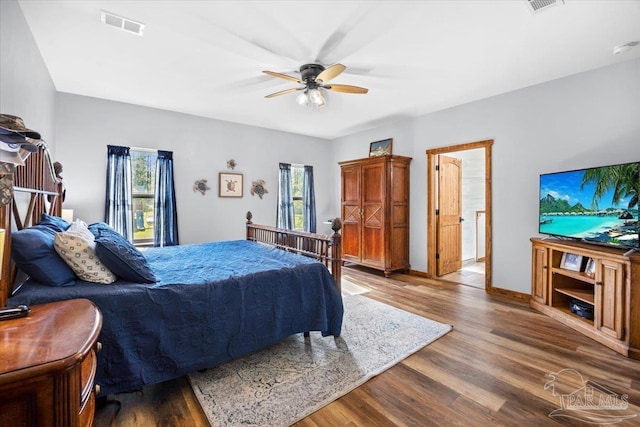 3351 Velor Rd, Mcdavid, FL 32568 - bedroom featuring baseboards, visible vents, wood finished floors, and a ceiling fan