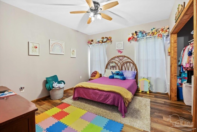 3351 Velor Rd, Mcdavid, FL 32568 - bedroom with wood finished floors and a ceiling fan