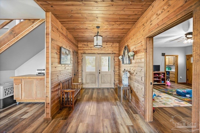 3351 Velor Rd, Mcdavid, FL 32568 - entryway featuring wood ceiling, wooden walls, ceiling fan, and wood finished floors