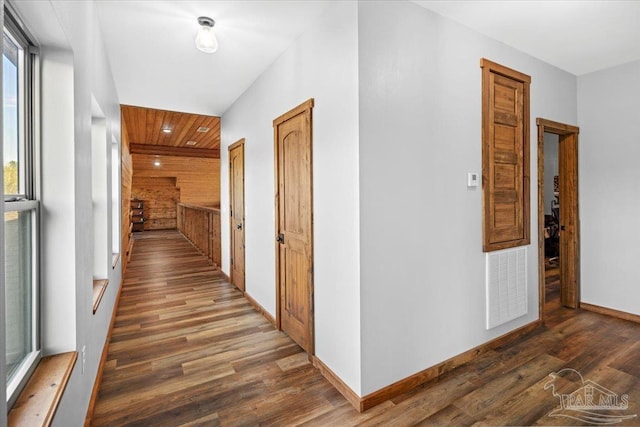 3351 Velor Rd, Mcdavid, FL 32568 - hall with baseboards, visible vents, and wood finished floors