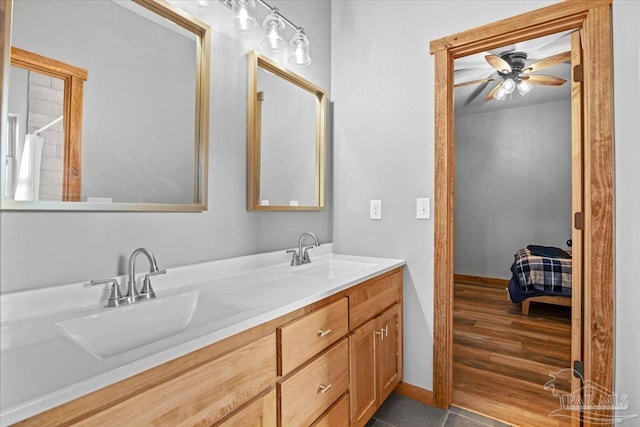 3351 Velor Rd, Mcdavid, FL 32568 - ensuite bathroom featuring a ceiling fan, a sink, double vanity, and ensuite bath