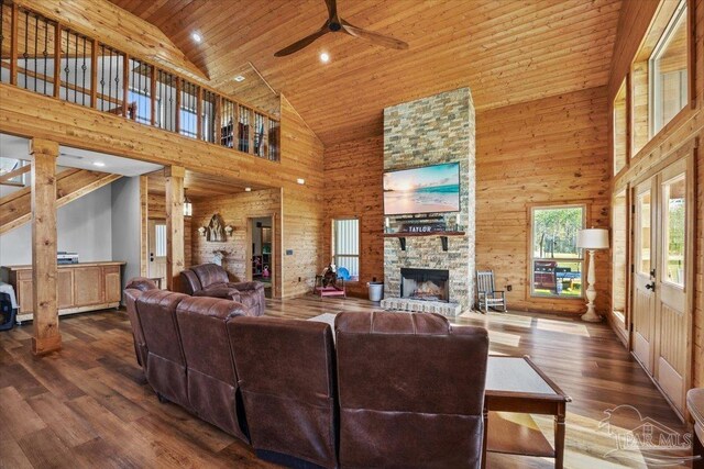 3351 Velor Rd, Mcdavid, FL 32568 - living room with a fireplace, wood finished floors, wooden ceiling, and ceiling fan